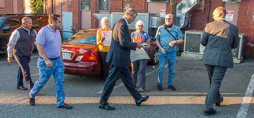 Governor Baker is met by protesters of Breathe Clean North Shore