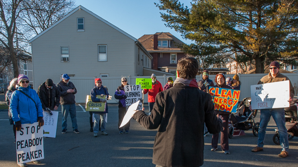 Logan Malik of Mass Climate Action Network addresses concluding ceremony at the Peabody Council on Aging