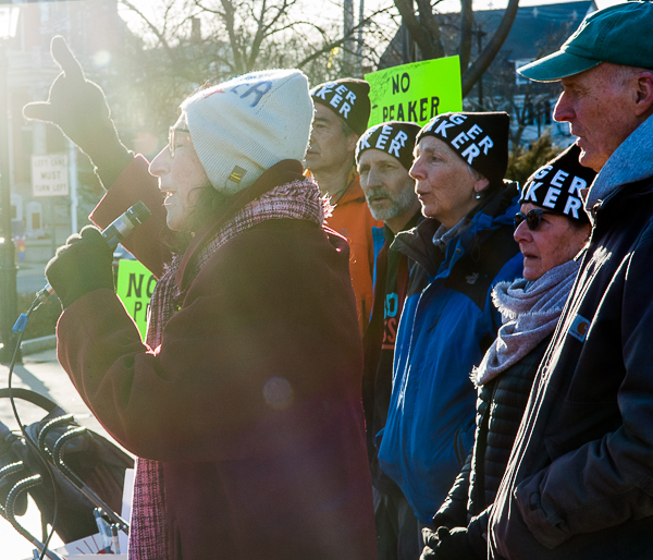 Judith Black, a hunger striker, leads singing