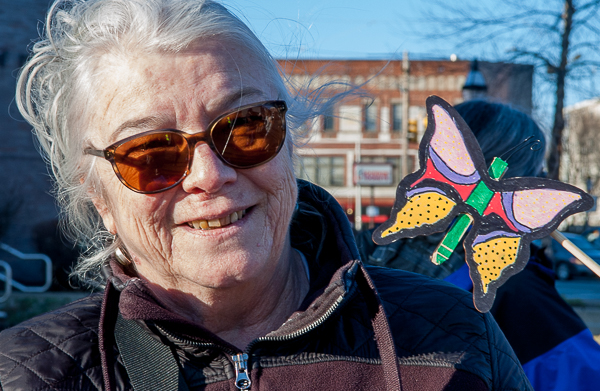 Susan Smoller, celebrating first year of Breathe Clean North Shore, displays symbolic butterfly