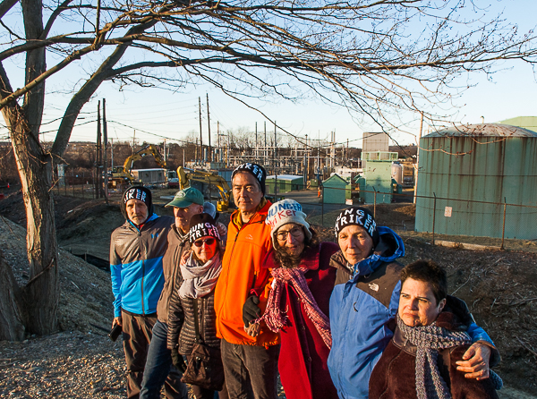 Hunger strikers overlooking Waters River Facility of the Peabodyh Municipal Light Plant