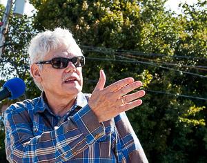 Monte Pearson gestures while speaking to demonstrators at Danversport bridge