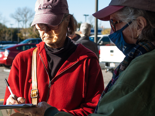 Shopper signs petition at Market Basket