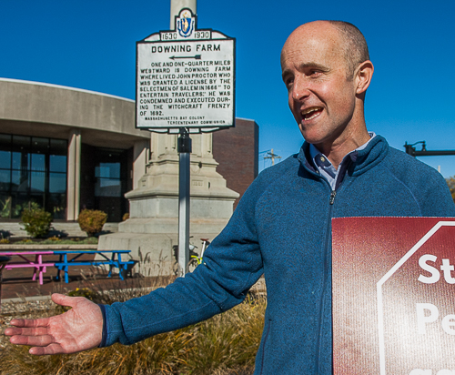 Former Senator Ben Downing, candidate for Governor, joins demonstration, holds sign