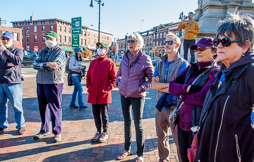 Volunteers assemble to get instructions on morning signature drive