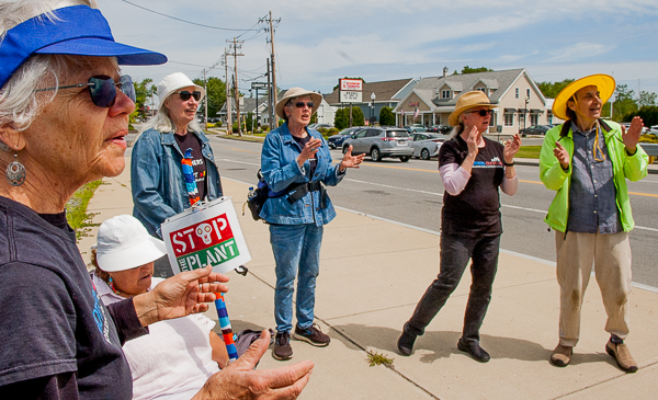 Members of Singers Out Front lead singing