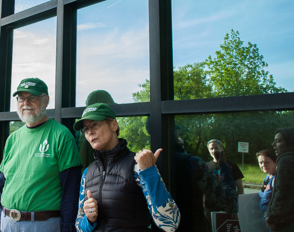 Demonstrators at the PMLP offices