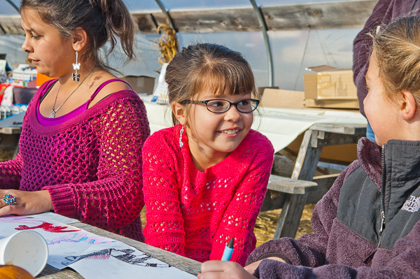 Children work on art project in greenhouse during fall festival at Brooksby Farm