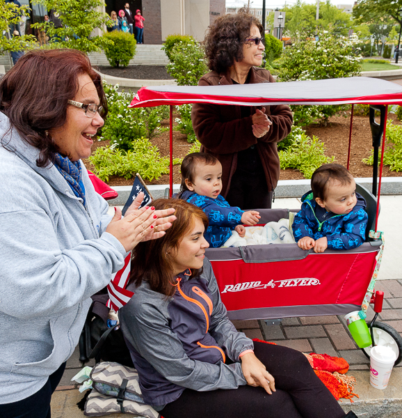 Mothers and children welcome the marchers