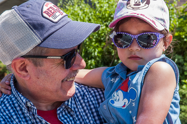 Man and child at Memorial Day parade