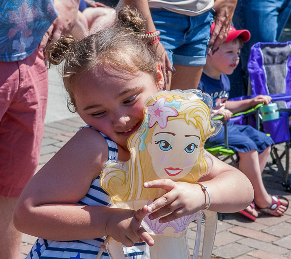 Girl play with her doll