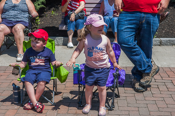 Two children watching the Memorial Day parade