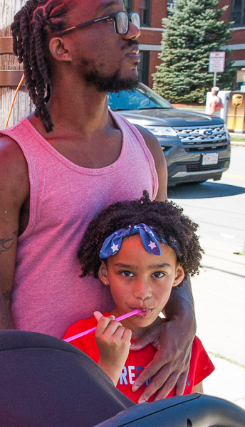 Father and child at Memorial Day parade