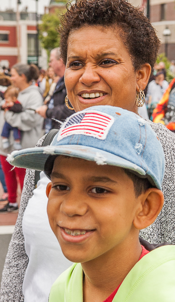 Mother and son watching the Memorial Day parade