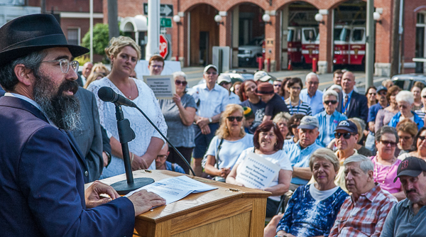 Speaker at interfaith gathering against antisemitism, city hall