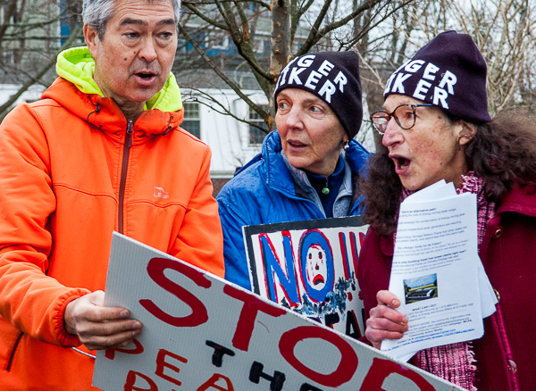 Nathan Phillips, Sue Donaldson, and Judith Black leading the chants