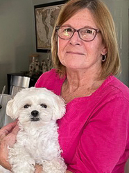 Joy Gurrie holding dog