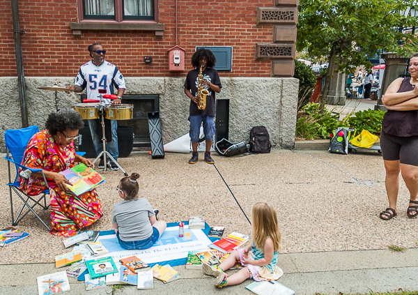 Reading and music at library courtyard